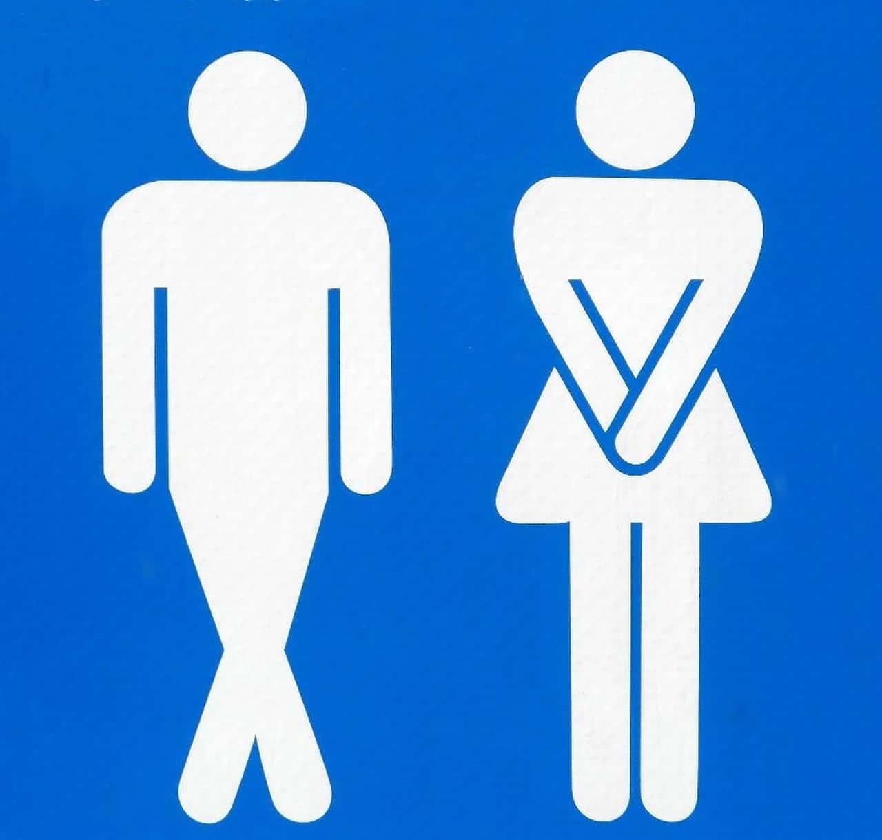 man and woman bathroom signs indicating they can't hold it much longer