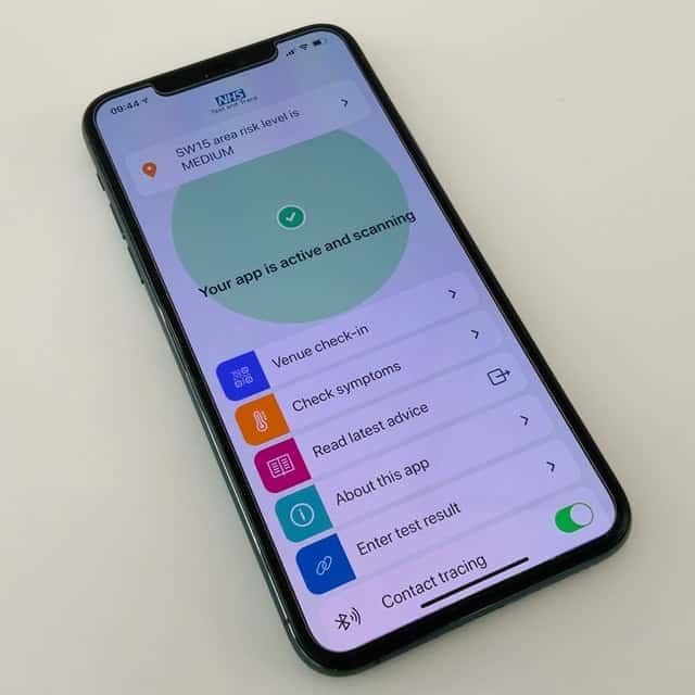 A Covid-19 tracker app, with an indicator that it's currently functioning and buttons to select in these categories ' venue check-in', 'check symptoms', 'read latest advice', 'about this app', and 'enter test result'